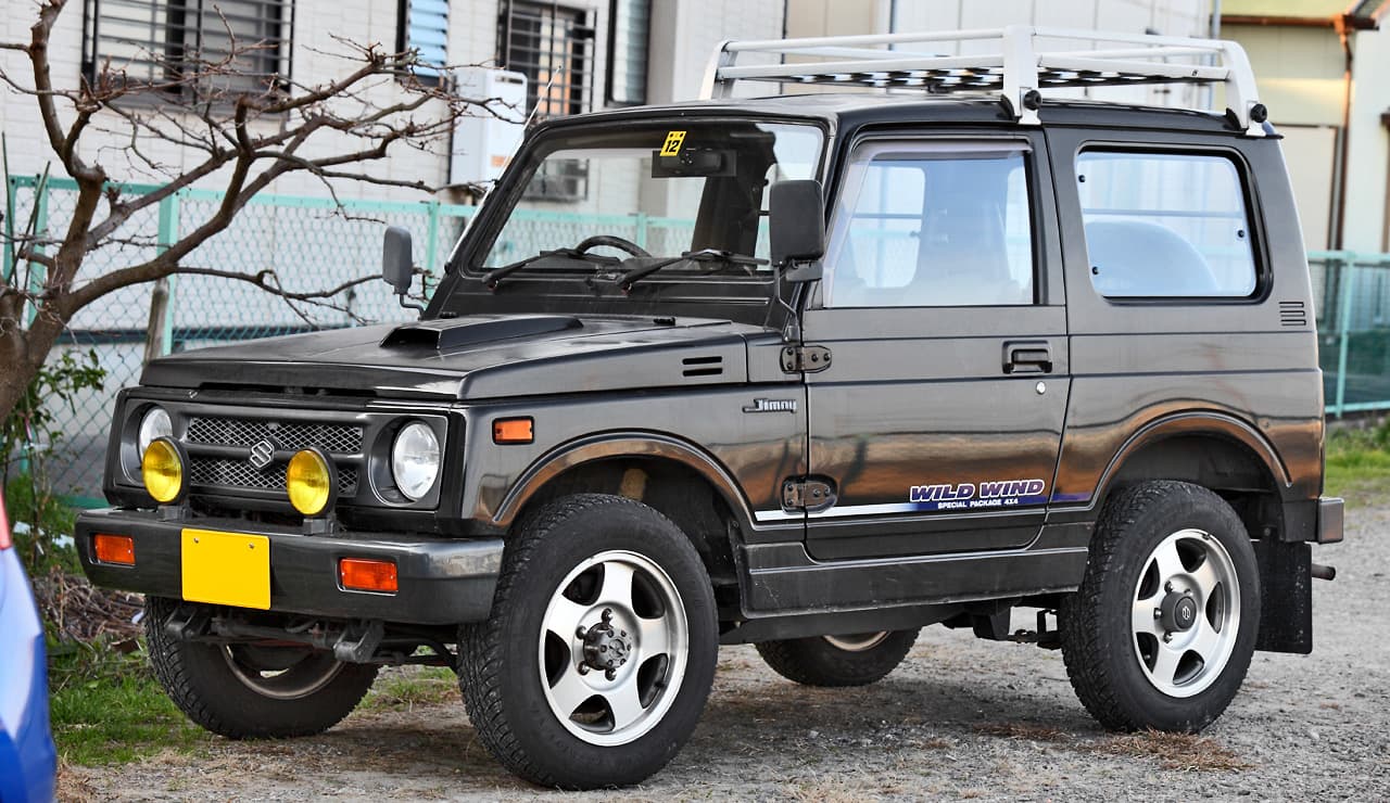 Suzuki Jimny JA11 kei 4x4 front three-quarter view